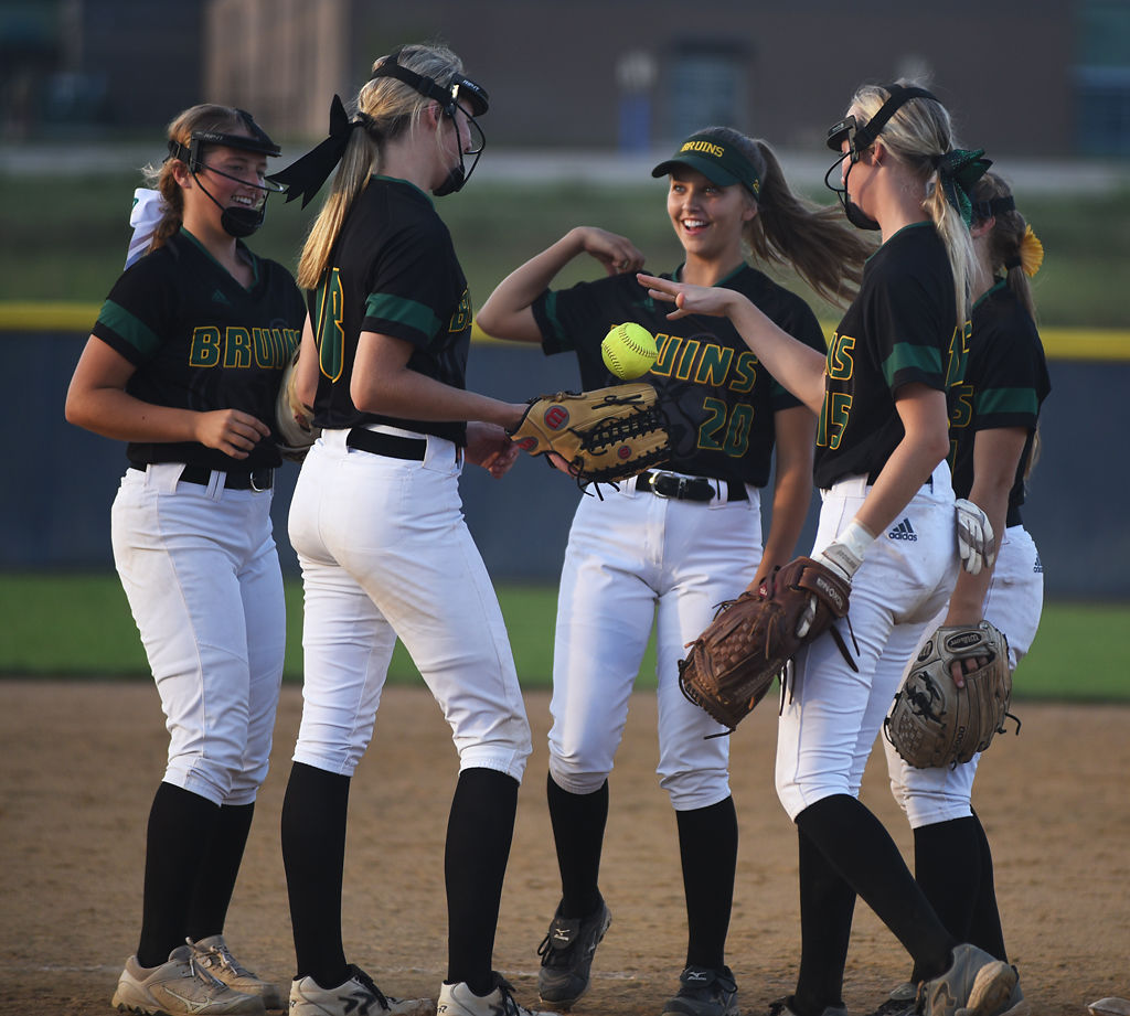Bruins infield celebrate after an out
